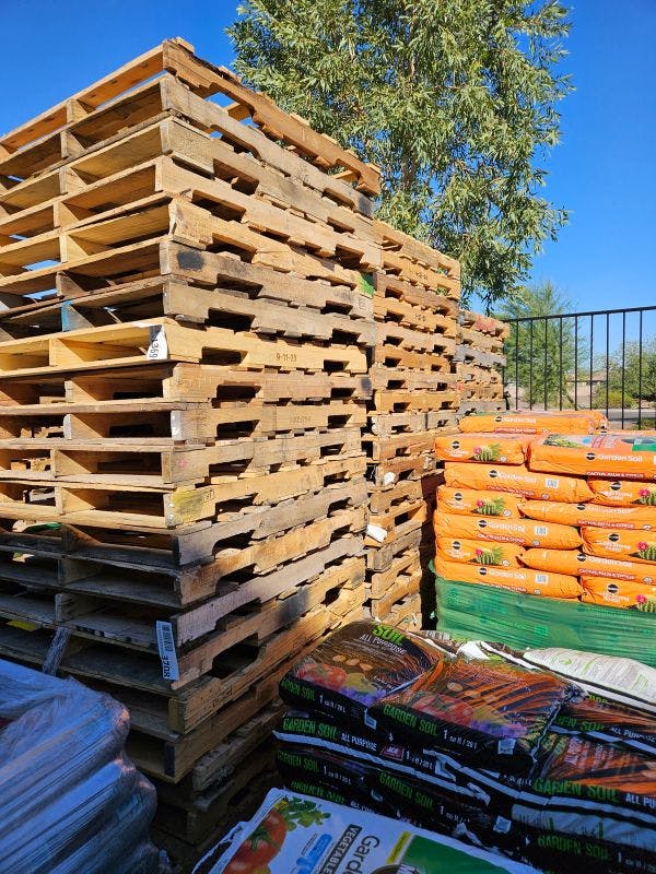 Stack of Used Grade B Pallets