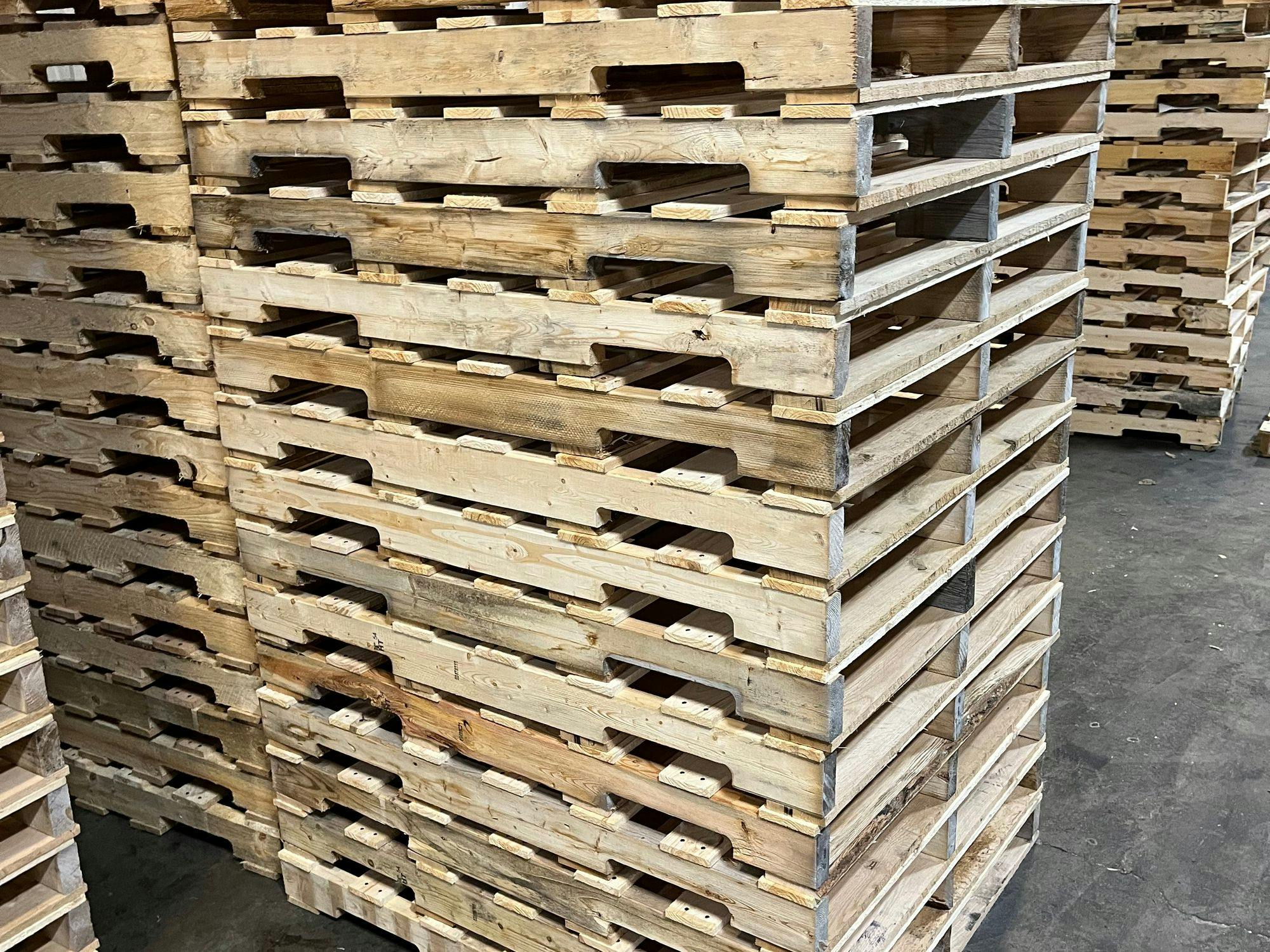 Stack of White Pin 48 Forty Pallets 