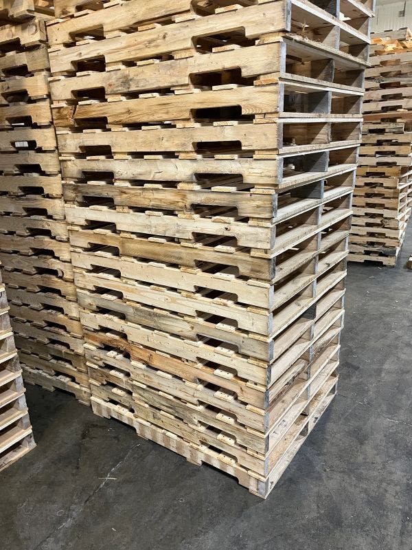 Stack of White Pin 48 Forty Pallets 