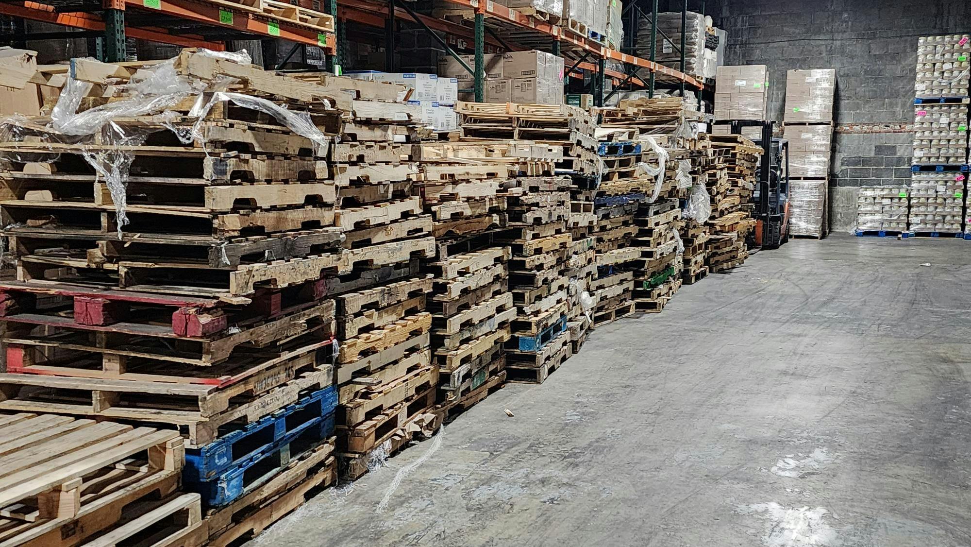 Stack of pallet cores in a warehouse 