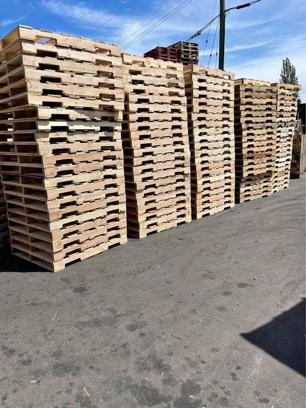 5 stacks of HT Pallets 